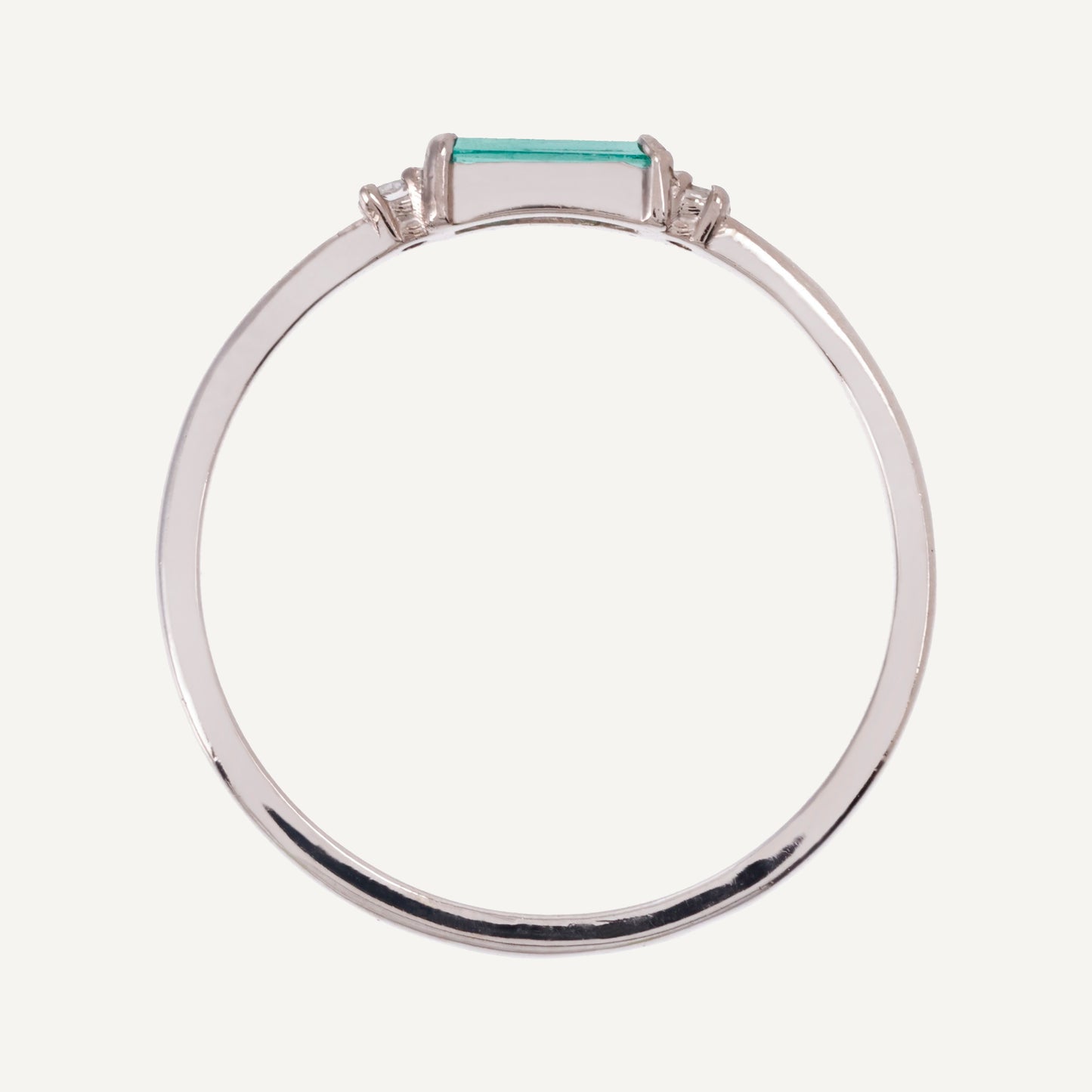 ANILLO ESMERALDA BAGUETTE Y DIAMANTES REDONDOS