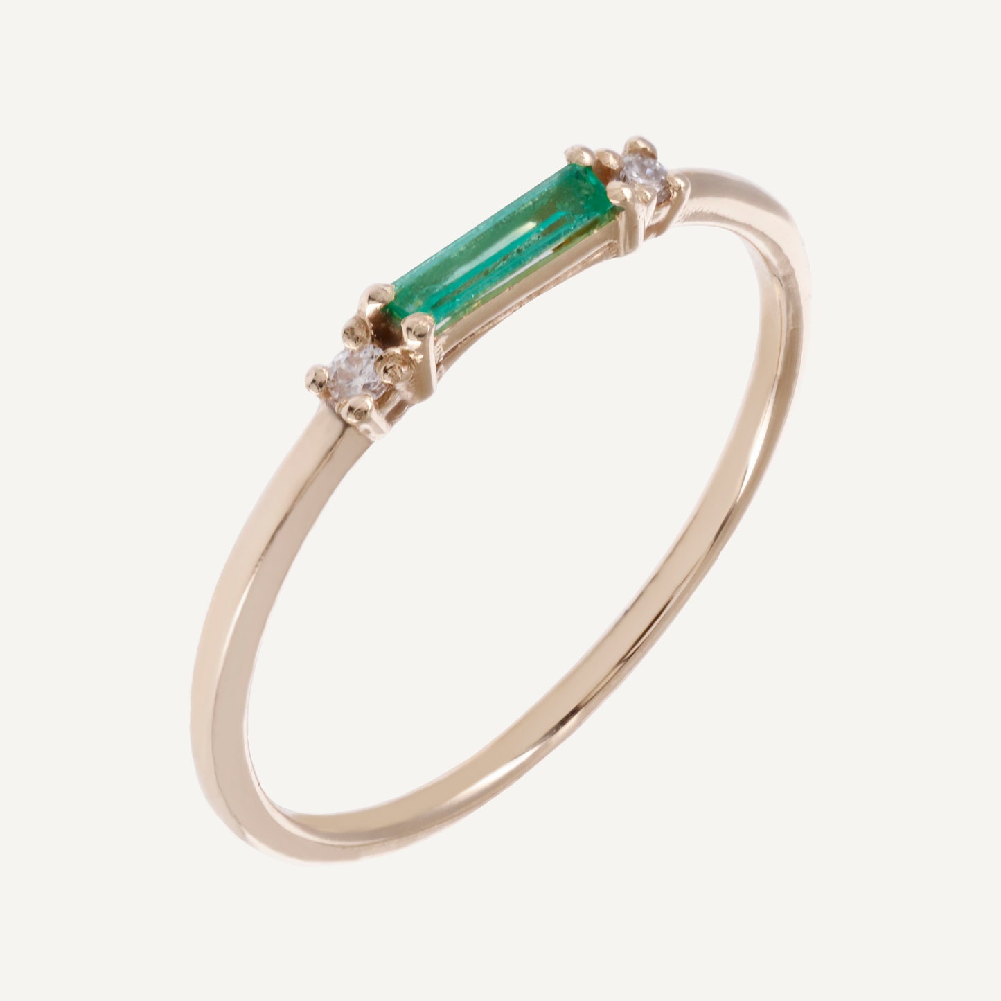 ANILLO ESMERALDA BAGUETTE Y DIAMANTES REDONDOS